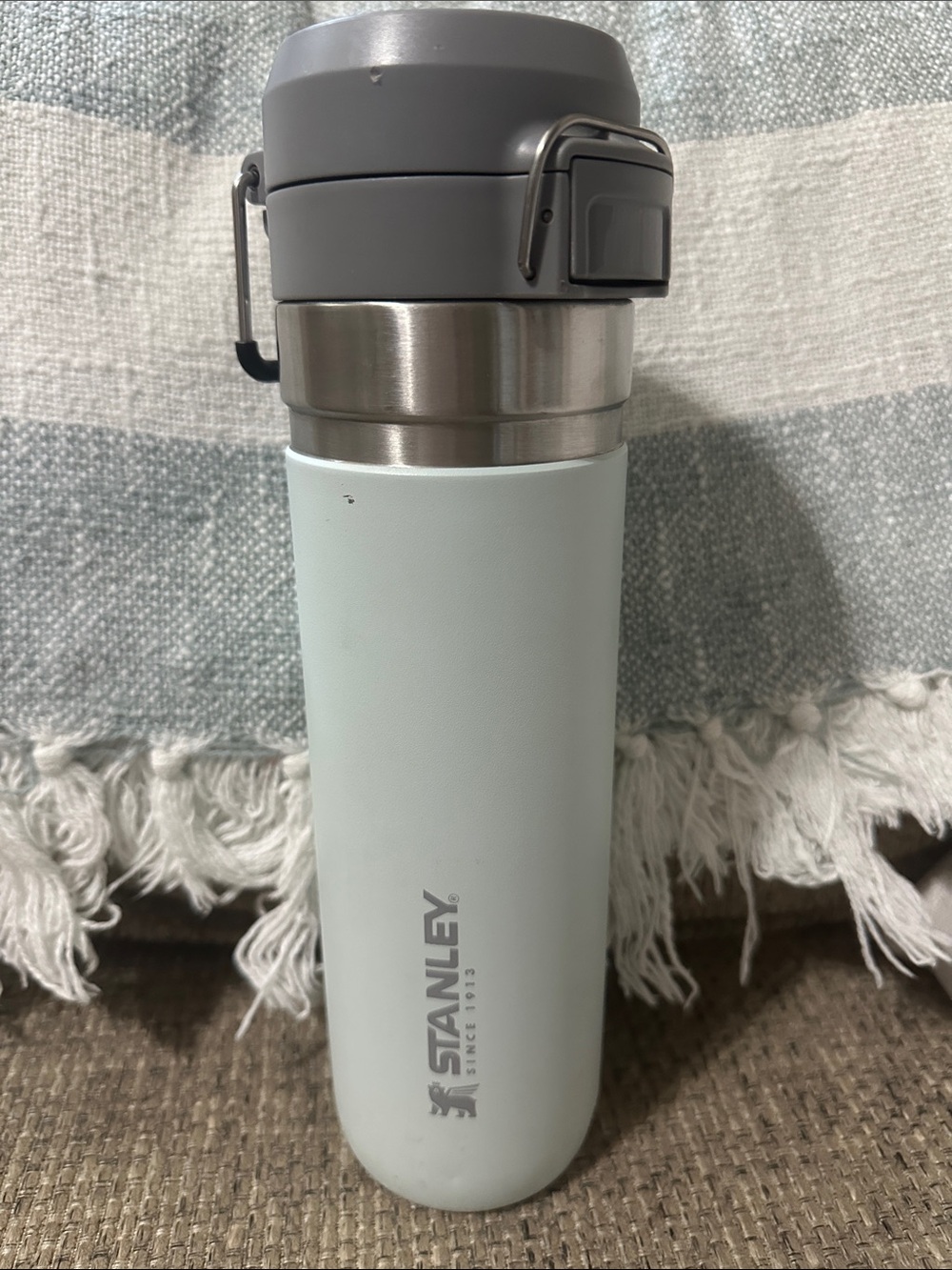 Stanley Pale Mint Green Travel Bottle with Gray Lid 24 oz